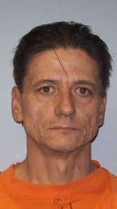 Man found dead at Essex Motel in...