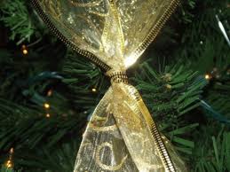 A christmas present wouldn't be complete without being tied with the perfect ribbon, so it stands to reason that your christmas tree deserves the same attention. How To Crisscross Ribbons On A Christmas Tree Holidappy