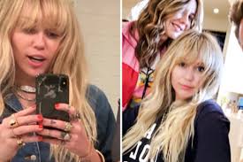 Miley cyrus now has hannah montana's hair. Miley Cyrus Reveals Hannah Montana Blonde Hair And Bangs Allure