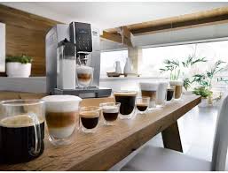 These machines pack a grinder in with the machine and automate the process. Delonghi Dinamica Bean To Cup Coffee Machine Ecam35075s Amazon Ca Home