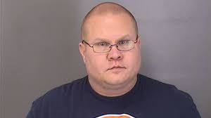 Douglas County Corrections officer accused of stealing thousands