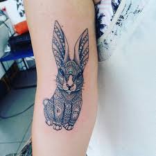 The lower part of the rock's left arm tattoo is a tortoiseshell design. Chinese Zodiac Tattoos Popsugar Love Sex