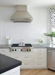 White beveled arabesque tile for the backsplash. Kitchen Arabesque Tile Backsplash Design Ideas