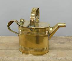 Maybe you would like to learn more about one of these? Antique Watering Can Brass New England Garden Company