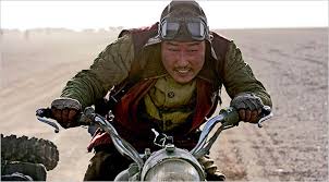 The good (a bounty hunter), the bad (a hitman), and the weird (a thief) battle the army and the bandits in a if i ever had a hip bar i think the good, the bad, the weird would be one of the films i would show on the tvs. Kim Jee Woon Stirs Up 1930s Train Robbing Action The New York Times