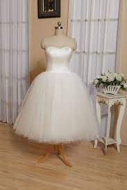 Tulle a line wedding dress with plunging neckline and floral appliques. Short Wedding Dress Tulle Skirt Satin Bodice Bridesmaid Dress Lace Up Back Corset Plu Tulle Wedding Dress Short Tulle Skirt Wedding Dress Tutu Wedding Dresses