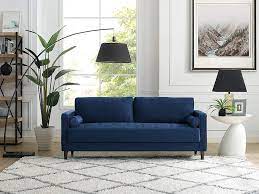 For dark blue velvet, you can have warm colors such as burnt orange or red. What Color Rug Goes With A Blue Couch Decor Snob