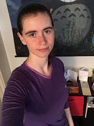 Purple cheerleading uniform for March 2025