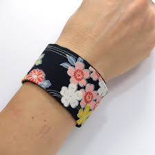 Heart and cross bracelet tattoos on wrist ideas for religious girls. Wide Black Cuff Bracelet Wrist Tattoo Scar Cover Fabric Pastel Flowers Polina Couture