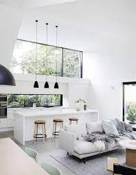 It uses straightforward furniture and dramatic modern art to complement the stark architecture. Loft Conversion Minimalism Interior House Interior Interior Design