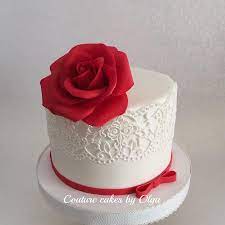 We love the way a chocolate cake shines through the subtle frosting. Red Rose Cake Fondant Cakes Birthday Rose Cake Design Simple Anniversary Cakes