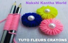 Tutos Astuces Pour Faire Des Fleurs En Laine Avec Des Crayons Motifs De Broderie A La Main Motifs De Broderie Faite Main Faire Des Fleurs