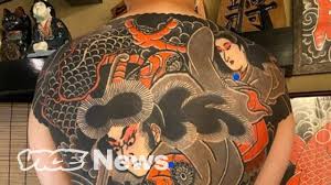 Upper arm japanese tiger tattoos. An Inside Look At Hand Poked Japanese Tattoos Youtube