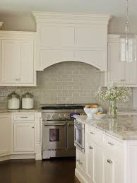 Kitchen With White Cabinets And Neutral Tile Backsplash Kitchen Remodel White Kitchen Backsplash Kitchen Renovation