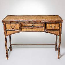 Working from home is never a chore with this small space saving desk. Bamboo And Rattan Desk Bamboo And Rattan Desk Console In Customized Antique Color Featuring Three Working Drawers With Bronzed Pulls On A Stretcher Base Finished Back 32 H X 43 W X 16 D 21st C Rfdkl003 Lindahorn Com Info Lindahorn Com
