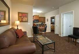 One bedroom includes a king bed, while the other is equipped with a queen. Mid Luxury Extended Stay 2 Bedroom Apartments For Rent In Airway Heights Washington United States