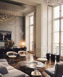 Cobalt blue armchairs and a couch in front of. Contemporary Living Room With High Ceiling