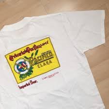 Todo lo que pasa aquí es natural. Cerveza Del Pacifico Logo Tee Logo Tees Tees Tshirt Logo