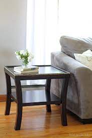 Adorning nailhead trim and gorgeous cherry finish make it a perfect center piece. Nailhead Trim End Table Makeover Love Grows Wild