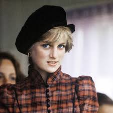 September 5, 1981, then Prince Charles, Prince of Wales and Diana, Princess  of Wales, wearing a tartan dress designed by Caroline Charles and a black  Tam o' shanter style hat, attend the