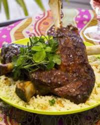 4) garnish the top of the lamb shanks with the thin shaved red onions and chopped parsley. Almond Couscous Jamie Geller