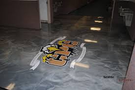 Designer Metallic Epoxy Floor With Embedded Logo Reflectorenhancer Resinfloors Metallicepoxy Epoxy Floor Metallic Epoxy Floor Flooring