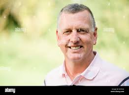 Mark Stevenson, golf coach and PGA professional can be seen teaching his  oldest pupil, Heinz (83) at the Golf club Gut Rieden In Starnberg, Germany,  27 September 2017. Photo: Andreas Gebert/dpa Stock