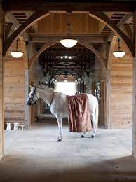 This beautiful, yet functional, barn was designed to house horses and the occasional social gathering. Barn Fence Oughton Limited Horse Barns Stables Horses