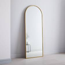 Just hang them on the rack hidden at the back of the mirror. Metal Frame Arched 188 Cm Floor Mirror Antique Brass West Elm Australia