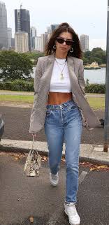 Emily ratajkowski wearing white dress with buttons, prada. Emily Ratajkowski Blue Denim Straight Fit Jeans Street Style Autumn Winter 2018 Sassy Daily Fashion News