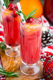 • add three freshly chopped strawberries and a few crushed or torn basil leaves. Christmas Punch Is An Easy And Delicious Holiday Party Drink Packed With Fruits Like Cranbe Holiday Party Drinks Christmas Drinks Alcohol Recipes Punch Recipes