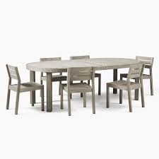 Dining chair cushions add a cozy touch to outdoor furniture, too. Portside Outdoor Round Expandable Dining Table Coastal Chairs Set