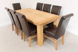 Contemporary, elegant counter height dining room set. 1 8m Riga Oak Dining Table 8 Emperor Brown Leather Dining Chairs