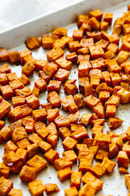 Slice the potatoes in half; Roasted Sweet Potatoes Perfectly Seasoned Downshiftology