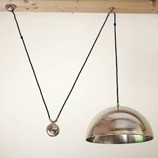 The array of fixtures showcases commitment to high style with robust construction and craftsmanship at an exceptional price. German Vintage Adjustable Counterweight Pendant Light Florian Schulz For Sale At 1stdibs