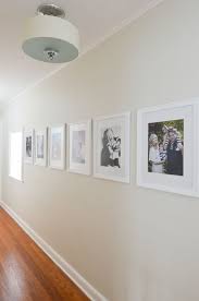 We did not find results for: Clean Simple White Frames Make A Beautiful Statement In This Long Hallway Hallway Decorating Hallway Pictures Home Decor