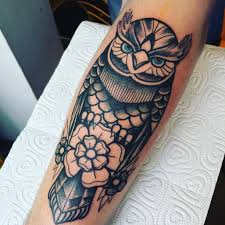 Black And White Owl And Rose Tattoo Designs Black And White Blue Eyed Owl Tattoo Perched On A Yorkshire Rose Traditional Tattoo Traditional Owl Tattoos Tattoos