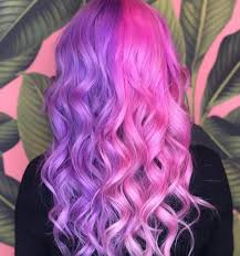 Stunningly effective on black and dark brown hair, a combination of green, purple and blue highlights are applied to the hair to give the impression of fluidity and light. 23 Brilliant Split Hair Color Ideas That Ll Make You Dye Your Hair