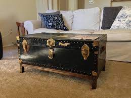 There's something wonderfully bon vivant about using an antique steamer trunk as a coffee table. 17 Old Trunks Turned Into Beautiful Vintage Table Antique Trunk Coffee Table Coffee Table Pottery Barn Coffee Table Vintage