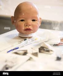 Realistic baby dolls hi-res stock photography and images