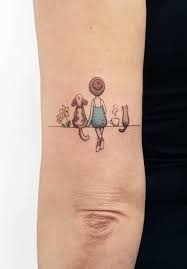 50 Beautiful Small And Colorful Tattoos Doozy List Cat And Dog Tattoo Dog Tattoos Color Tattoo
