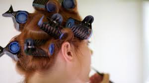 How do you put rollers in your hair? How To Use Heated Rollers To Create Loose Curls In Straight Hair