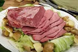 Thinly slice corned beef against the grain and serve with potatoes, carrots and cabbage, garnished with mustard and parsley, if desired. The History Of The New York Irish Corned Beef And Cabbage Beef Recipes Corned Beef Cabbage And Bacon