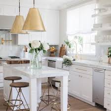 Sticking to white cabinets and walls is a good start, but there are many other ways to create extra room in your kitchen, or create the illusion of a bigger space than you have, all without sacrificing a sense of personality. 18 White Rooms That Ll Look Good Way Past Labor Day Brit Co