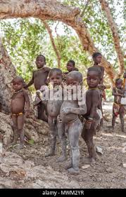 NAMIBE/ANGOLA - 28 AUG 2013 - African boys belonging to an angola tribe  from southern angola known by himbas Stock Photo - Alamy