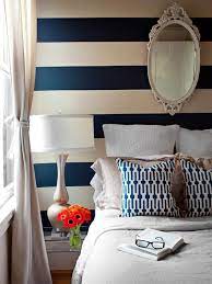 Pink and white striped wall. New Ways To Decorate With Shades Of Blue Home Decor Bold Bedroom Striped Walls