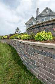 Learn the best way to level retaining wall blocks so your unilock wall will look and perform the way it should. Retaining Walls York Pa Choose These Unilock Wall Units Watson Supply
