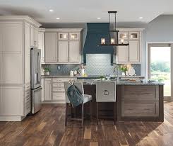 Thermofoil cabinets are available in a wide range of colors that mimic the look of paint. Diamond At Lowes Finishes Thatch On Maple