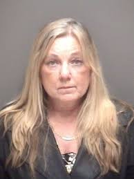 Santa Fe mom who checked WebMD while son was shot is charged