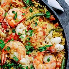 Easy Seafood Paella Recipe Main Dishes With Lobster Tails Water Olive Oil Yellow Onion Spanish Rice Garl Paella Recipe Seafood Seafood Paella Easy Seafood